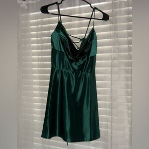 Short dark green silk dress.